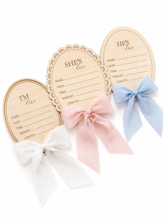 Personalised wooden birth announcement plaque with chiffon ribbon for newborn photos.