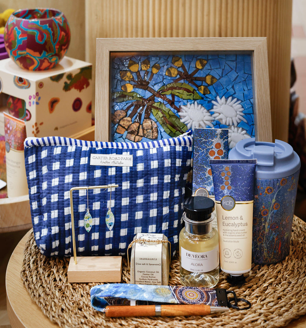 Gift hamper from Little Seedlings Gift Store Dianella with mosaic artwork, blue gingham bag, candles, hand cream and WA made gifts
