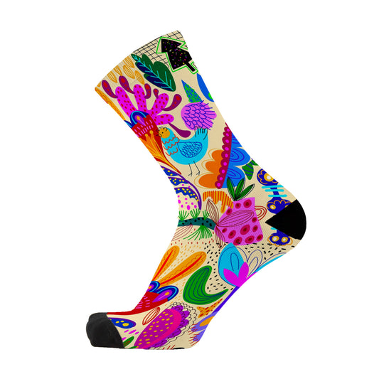 Colourful bamboo socks featuring flowers, leaves and a chicken on a beige background.
