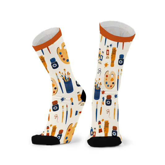 Art themed bamboo socks featuring paint and brushes on a white background.