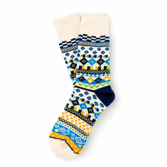 Colorful patterned socks on a white background. Scandinavian Style Socks for winter 