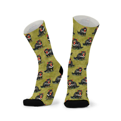 Tasmanian Devil bamboo socks featuring playful black Tasmanian Devils on an olive green background.