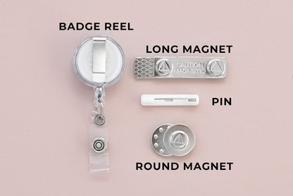 Backing options for Christmas badges: badge reel, long magnet, pin and round magnet
