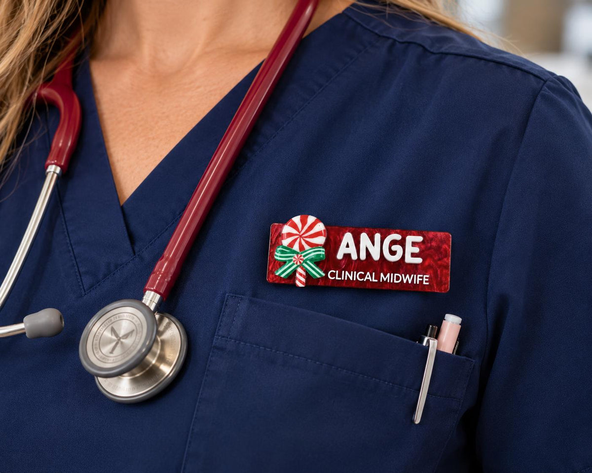 Personalised red Christmas candy cane name badge worn on a nurse's scrub top