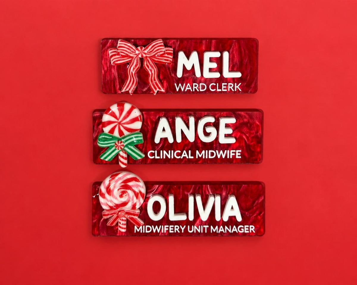 Personalised red Christmas name badges with candy cane bow, lollipop and swirl charms for nurses and midwives