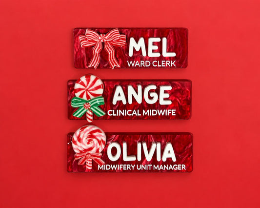Personalised red Christmas name badges with candy cane bow, lollipop and swirl charms for nurses and midwives
