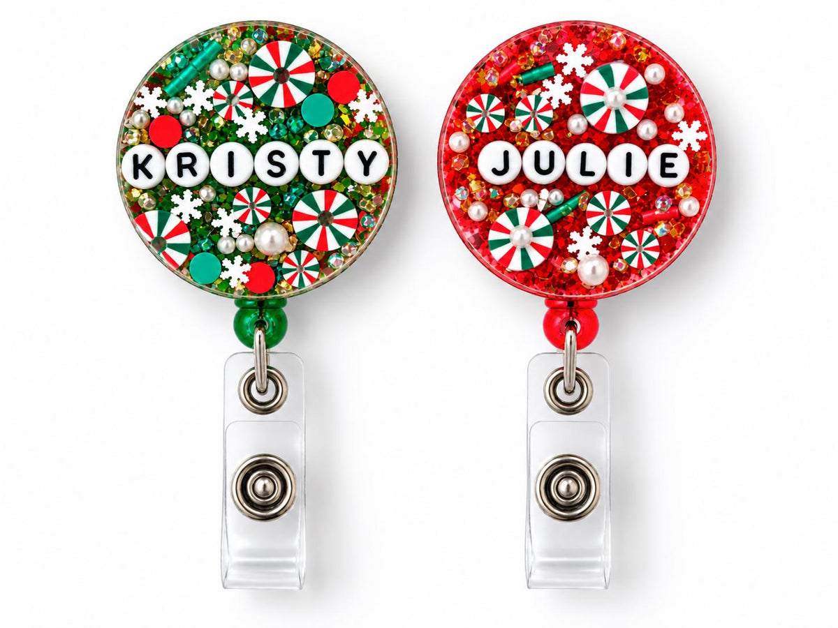 Green and red Christmas letter bead badge reels personalised with the names Kristy and Julie