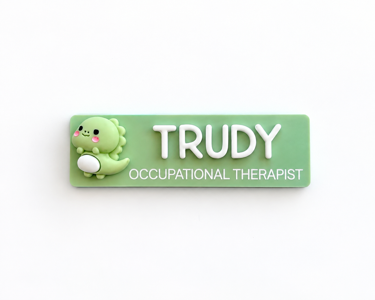 Green dinosaur name badge reading 'Trudy – Occupational Therapist'