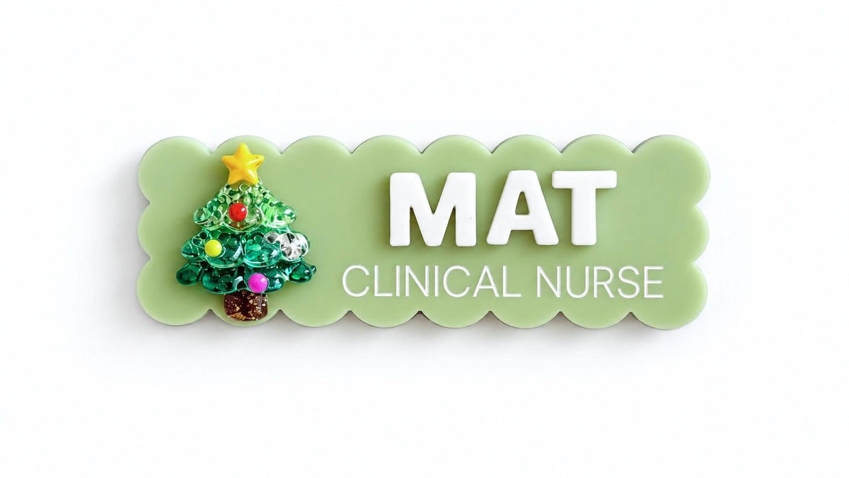 Light green scalloped Christmas name badge with tree charm reading Mat, Clinical Nurse