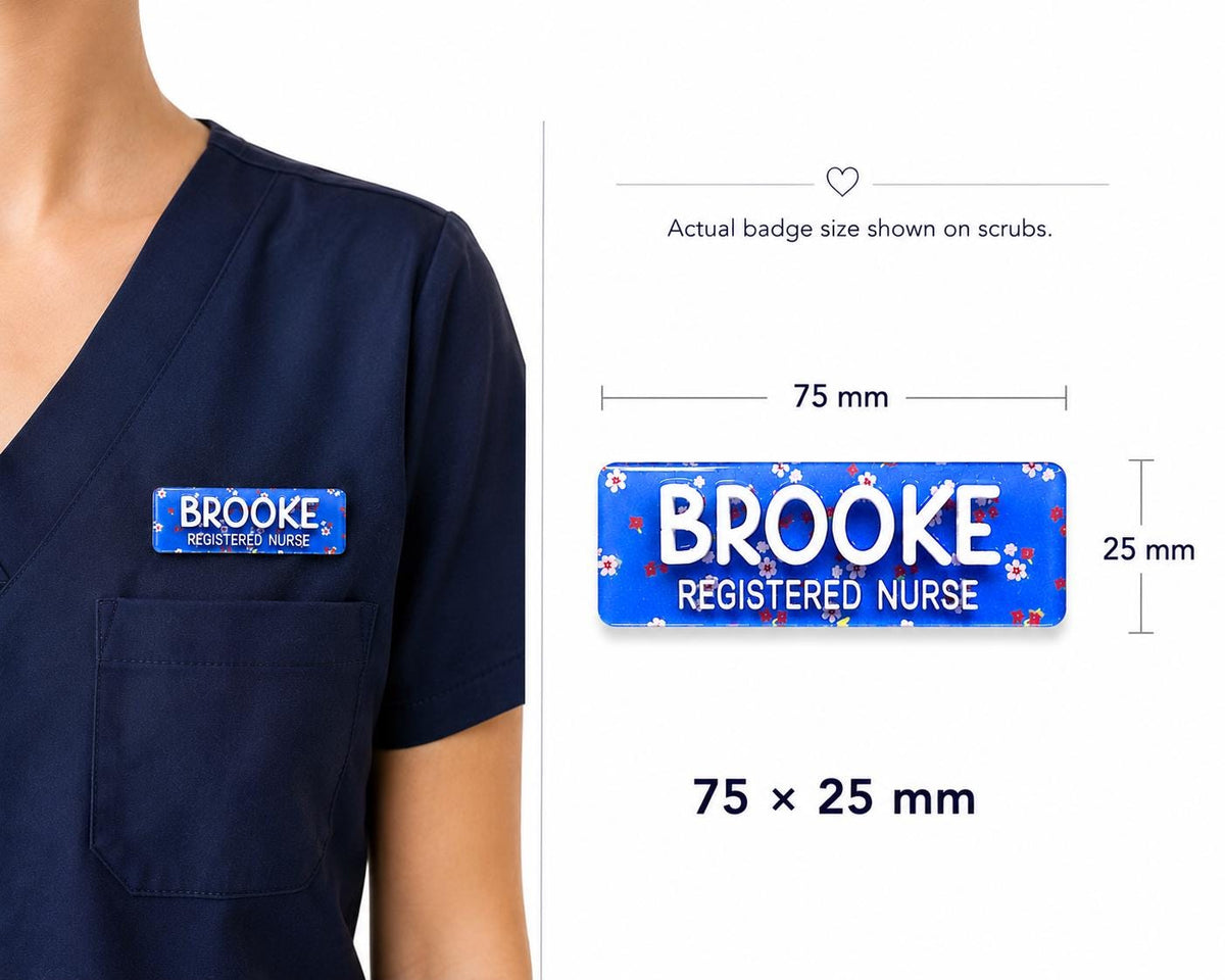 Size guide showing a 75 x 25 mm nurse name badge worn on navy scrubs