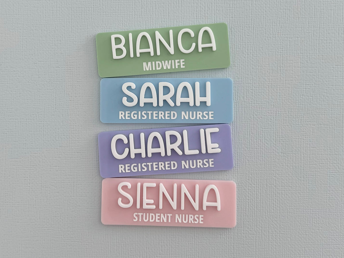 Pastel acrylic nurse name badges in sage, blue, purple and pink for midwives, registered nurses and student nurses