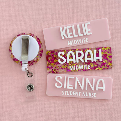 Pink glitter badge reel with pastel pink Kellie Midwife, Sarah Midwife and Sienna Student Nurse name badges