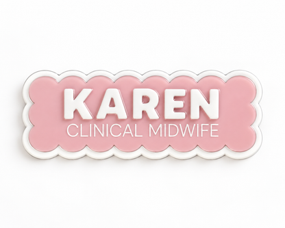 Pink scalloped midwife name badge reading 'Karen – Clinical Midwife'