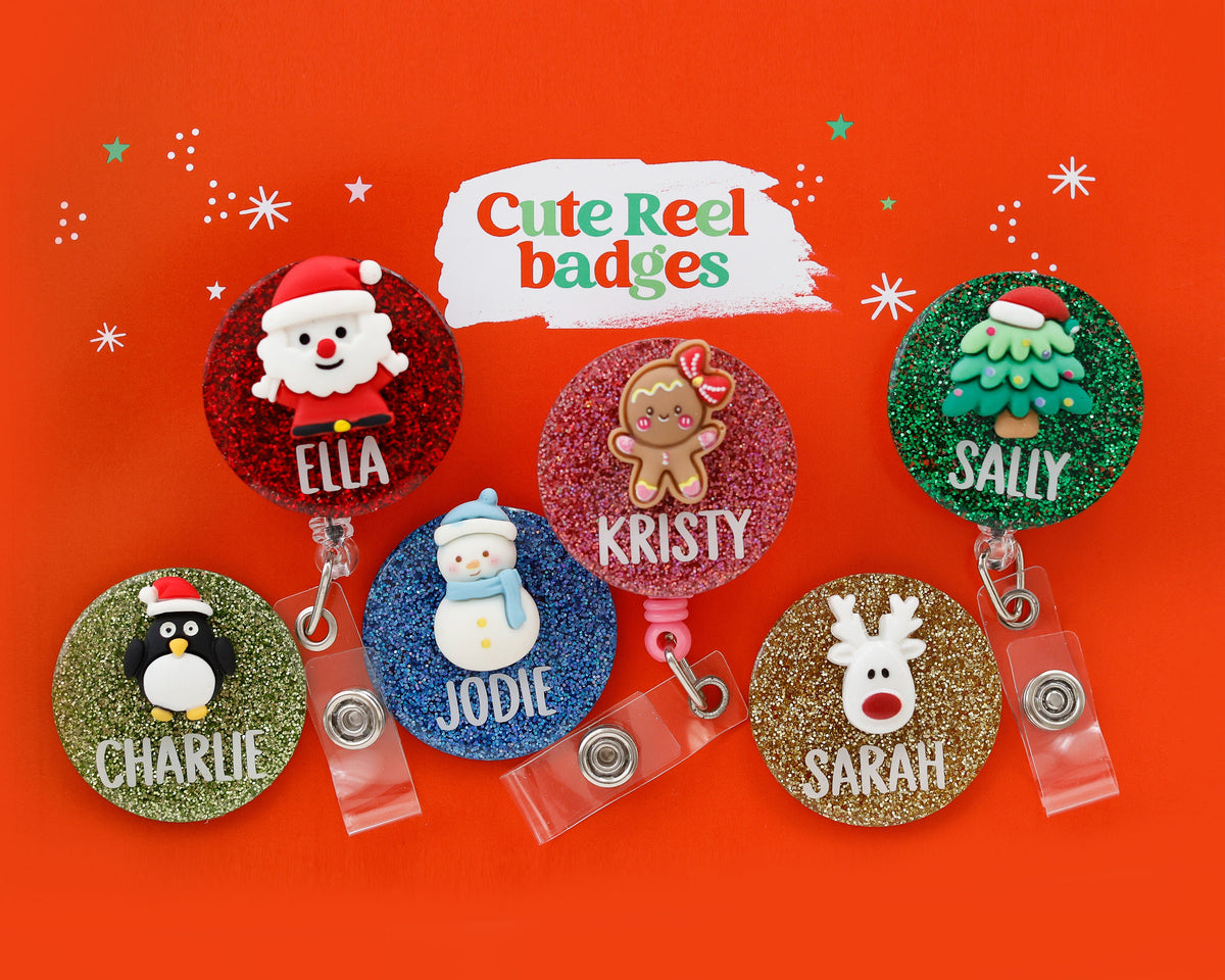 Round glitter Christmas badges with Santa, snowman, penguin and reindeer charms personalised with names