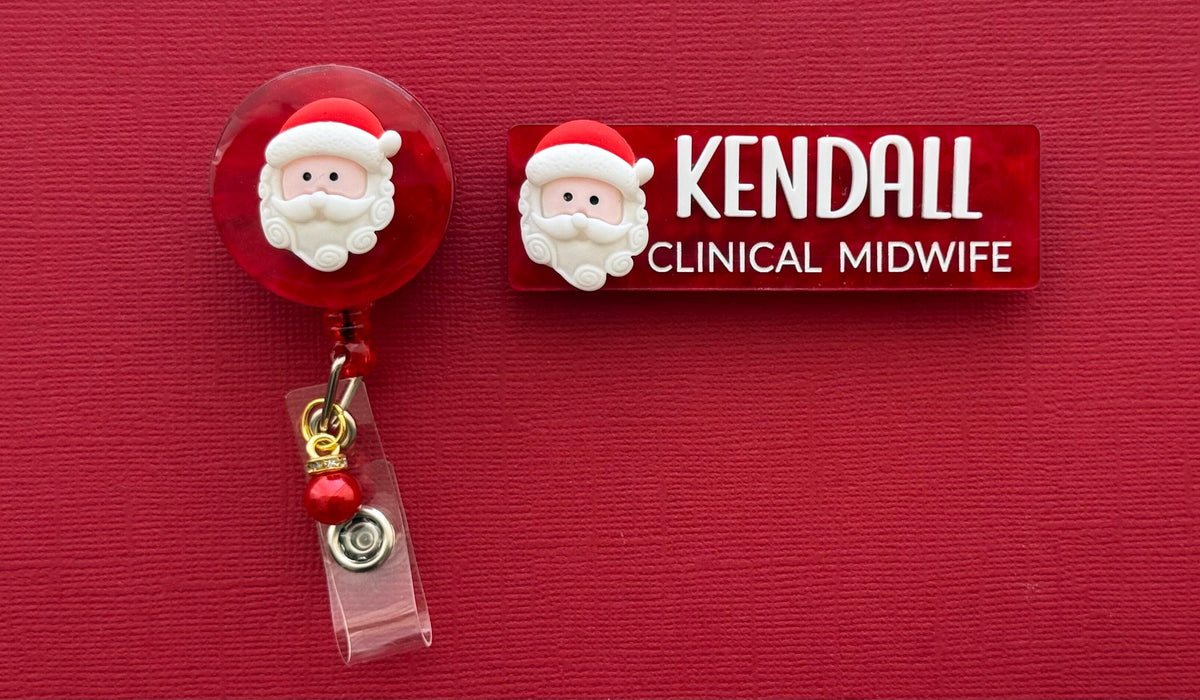 Santa Christmas badge reel shown with a matching Kendall Clinical Midwife name badge